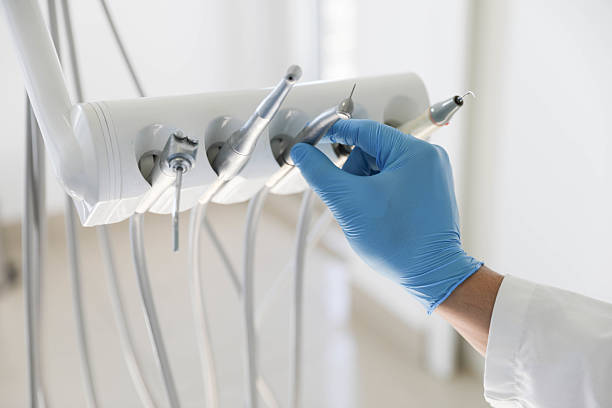 Professional Tooth Extraction technician working in Nicoma Park, OK